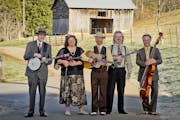 Monroe Crossing is, from left, David Robinson on banjo, Lisa Fuglie on fiddle, Derek Johnson on guitar, Matt Thompson on mandolin and Mark Anderson on