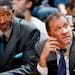 Minnesota Timberwolves coaches Sam Mitchell and Flip Saunders late in the game. Dallas beat Minnesota by a final score of 98-75. ] CARLOS GONZALEZ cgo