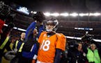 Denver Broncos quarterback Peyton Manning (18) leaves the field after an NFL divisional playoff football game against the Indianapolis Colts, Sunday, 