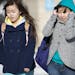 From left, Tang Moua,15, and Xong Moua, 14, make their way to the bus in the bitter cold after classes at Central High School let out on Wednesday aft