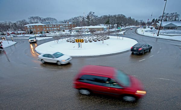 Drivers can expect to see more roundabouts in the coming years, and not just in the metro area. Above, drivers navigate the roundabout at 66th Street 