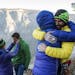 From left: Becca and Tommy Caldwell, and Jacqui Becker and Kevin Jorgeson embrace after the two men completed a free climb summit of the Dawn Wall of 