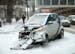A Car2Go smart car on S. 7th Street in downtown Minneapolis was involved in a crash during heavy snowfall on Thursday.