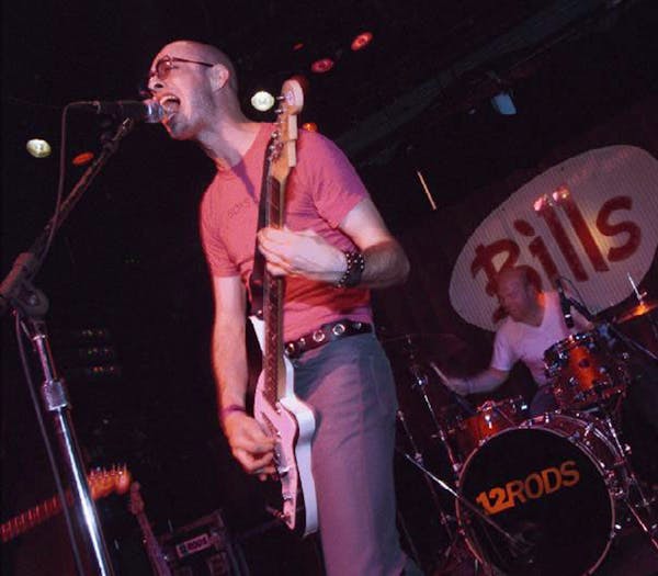 Singer/guitarist Ryan Olcott and drummer Dave King at a 12 Rods gig in New Jersey in 2000. Olcott said the first rehearsal or two were tough, but “t