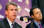 FILE - In this Sept. 17, 2014, file photo, Minnesota Vikings general manager Rick Spielman, left, speaks as owner/chairman Mark Wilf listens. The pres