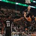 Zach LaVine took the ball from fellow 19-year-old Wolves rookie Andrew Wiggins oh his way to winning Saturday night's All-Star slam dunk competition i