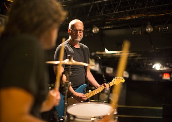 Bob Mould glanced at drummer Jon Wurster while working out old songs during a rehearsal in 7th Street Entry last August.