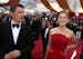 Ethan Hawke, left, and Rosamund Pike appear on the red carpet at the Oscars on Sunday, Feb. 22, 2015, at the Dolby Theatre in Los Angeles.