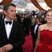 Ethan Hawke, left, and Rosamund Pike appear on the red carpet at the Oscars on Sunday, Feb. 22, 2015, at the Dolby Theatre in Los Angeles.