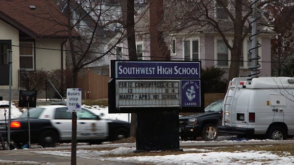 A police car drove by Southwest High School Wednesday morning. The school was shut down because of a credible threat.
