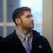 Former University of Minnesota quarterback Philip Nelson entered the Blue Earth County Justice Center Wednesday.
