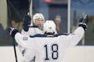 Blaine forward Riley Tufte (27), back, celebrates with defender Joey Blommer (18) after Tufte scored a goal against Centennial in the first period. ] 