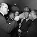 FILE - In this March 1, 1965 file photo, Registrar Carl Golson shakes a finger at Dr. Martin Luther King Jr., during meeting at the courthouse in Hayn