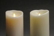 The flameless candle technology is the focus of a legal fight. A candle made by an Eden Prairie company candle is at top left, and a candle made by a 
