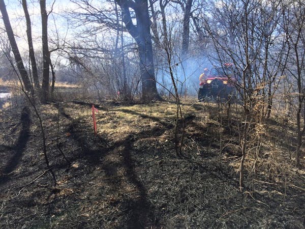 Crews were on the scene Thursday afternoon of a grass fire on the southern border of the fire department that serves Spring Lake Park, Blaine and Moun