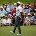 Tiger Woods reacts after missing a putt on the 16th green during the first round of the Masters golf tournament Thursday, April 9, 2015, in Augusta, G
