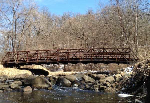 A common sight: a footbridge along Nine Mile Creek.