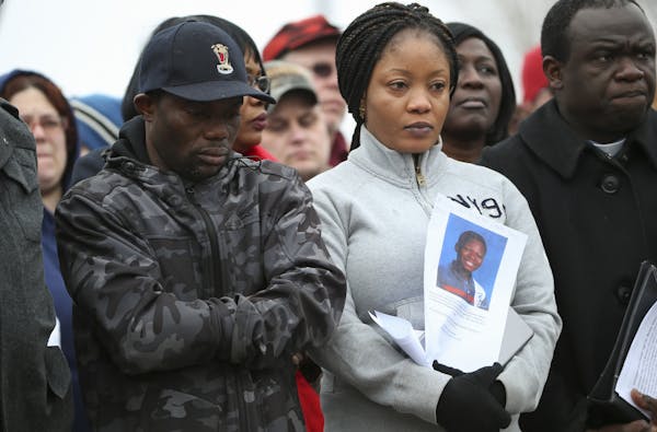 Barway Collins’ father and stepmother, Pierre and Yamah Collins, stood with supporters at a vigil Monday afternoon in Crystal.