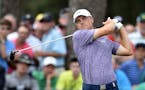 Jordan Spieth hits from the 16th tee during the second round of the Masters at Augusta National Golf Club on Friday, April 10, 2015, in Augusta, Ga. (
