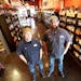 Jason Alvey, left, owner of Four Firkins, and Bryan Buser, store general manager. The establishment opened last year in Oakdale.