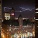 Lightning illuminates the sky over downtown Minneapolis on Wednesday, April 1, 2015.