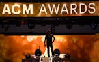 Jason Aldean performs at the 50th annual Academy of Country Music Awards at AT&T Stadium on Sunday, April 19, 2015, in Arlington, Texas.