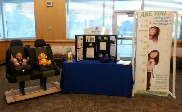 A Safe Kids Anoka County open house touched the bases on car seat safety. Note the unhappy, unstrapped stuffed animal.