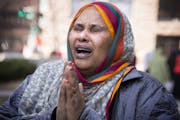 Halima Yusuf, a friend of terror suspect Hanad Mustafe Musse’s family, wept for the young men outside the U.S. Courthouse in St. Paul.