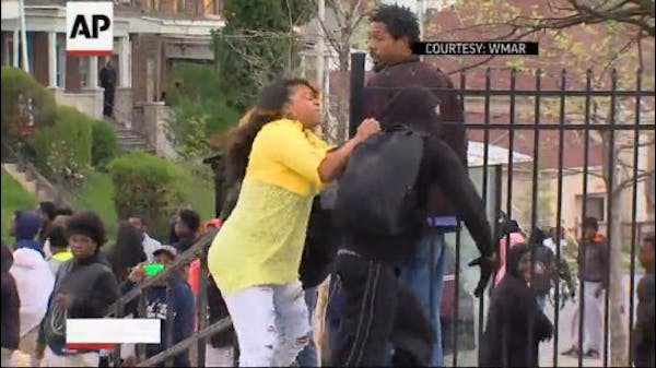 Woman confronts Baltimore protester