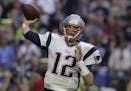 New England Patriots quarterback Tom Brady (12)