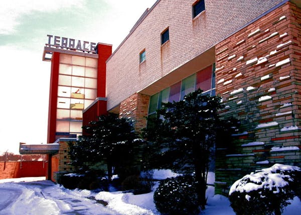 Liebenberg and Kaplan’s 1951 Terrace Theater in Robbinsdale features modern lines, brick columns, slanted lobby windows and a glassy tower.