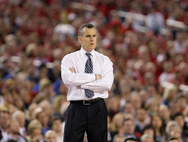 FILE - In this April 5, 2014, file photo, Florida head coach Billy Donovan looks on during the second half of an NCAA Final Four tournament college ba