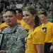 Fox Sports North Girl Jenny Taft appeared with an Army officer during her trip to Germany as part of Fox’s “Spring Training to the Troops” initi