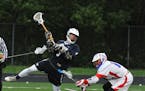 Champlin Park midfielder Gage Monson unleashed a shot at the Armstrong net in a 5-4 overtime victory Monday on the road to remain undefeated for the s