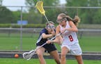 Coon Rapids' Bailey Ryan (8) against Champlin Park. Photo by Rick Orndorf