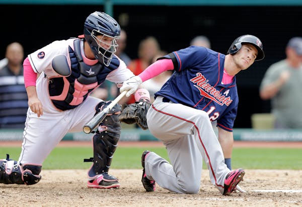 Twins catcher Chris Herrmann struck out swinging in the ninth inning Sunday, tagged by Indians counterpart Roberto Perez as Cleveland won 8-2.