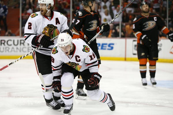 The Chicago Blackhawks' Jonathan Toews (19) and Duncan Keith (2) celebrate a goal during the first period against the Anaheim Ducks in Game 7 of the W