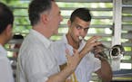 Minnesota Orchestra trumpeter Robert Dorer, center, gave student Antonio Diaz Martinez some tips during a visit to Cuba’s Escuela Nacional de Músic