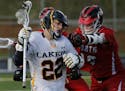Carter Collins (22) and the rest of the Lakers lacrosse team know that they have a target on their backs. (Richard Tsong-Taatarii, Star Tribune)