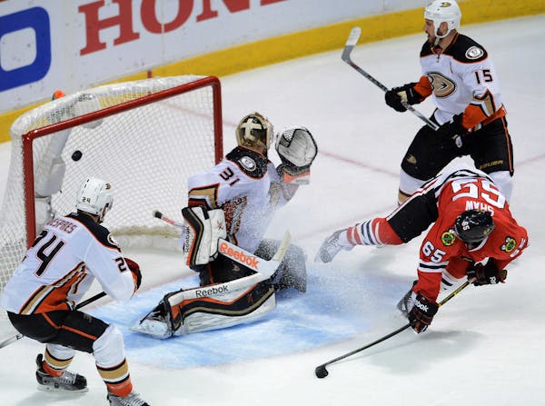 Chicago Blackhawks center Andrew Shaw (65) scores his first goal during the third period against the Anaheim Ducks in Game 6 of the Western Conference