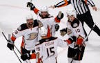 Anaheim Ducks celebrate the team's first score against the Chicago Blackhawks during the first period in Game 3 of the Western Conference finals of th