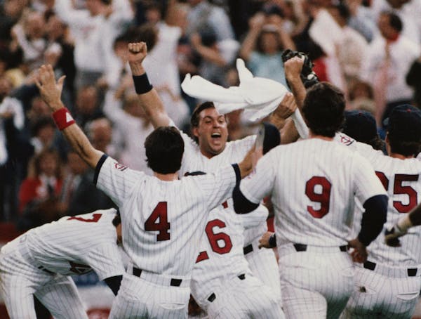 Minnesota Twins celebrate after the final out of the World Series, Oct. 25 1987.