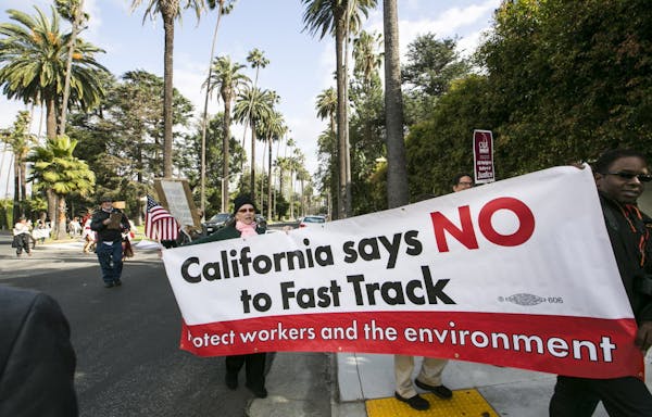 Los Angeles residents protested to oppose the trade promotion authority bill up for debate in Washington.