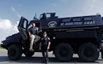 Sgt. Martin Sayre and Lt. Jeff Oxton, of the St. Cloud police department SWAT team and their Mine Resistant Ambush Protected vehicle (MRAP), that was 