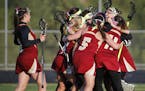 Lakeville South players celebrated their overtime victory over third-ranked Prior Lake. (Richard Tsong-Taatarii, Star Tribune)
