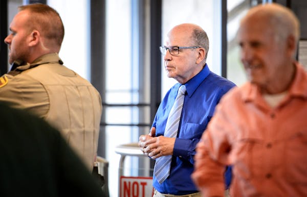 Francis Hoefgen, shown entering the Dakota County court in Hastings Tuesday, was acquitted of sexual abuse charges.