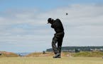 Phil Mickelson hits his tee shot on the 10th hole during a practice round for the U.S. Open golf tournament at Chambers Bay on Tuesday, June 16, 2015 