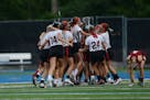 Eden Prairie celebrated its double-overtime victory over Lakeville South on Saturday evening in Minnetonka.