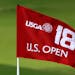 FILE - In this Sept. 30, 2014, file photo, the U.S. Open 18th hole flag is shown at Chambers Bay, the host course for the 2015 U.S. Open golf tourname