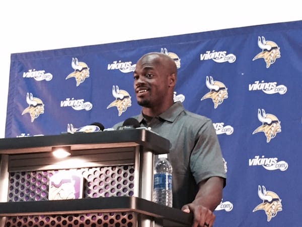 Vikings running back Adrian Peterson addresses the media from Winter Park on Tuesday, June 2, 2015.